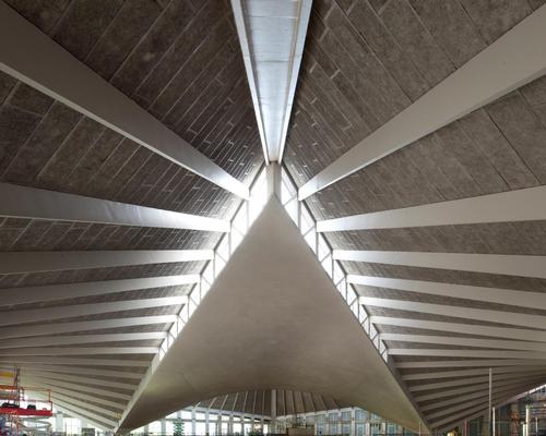 The roof was supported on stilts while extensive work to the shell of the building took place / Gareth Gardner