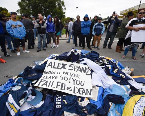 Angry San Diego Chargers fans protest outside the franchise's headquarters following the announcement / Denis Poroy/AP/Press Association Images