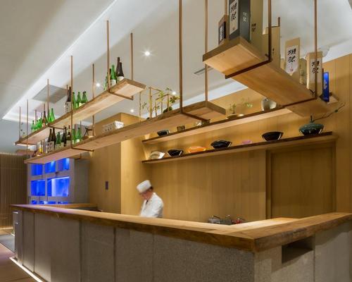 A small bar is one of the few public areas in the restaurant / Golucci International