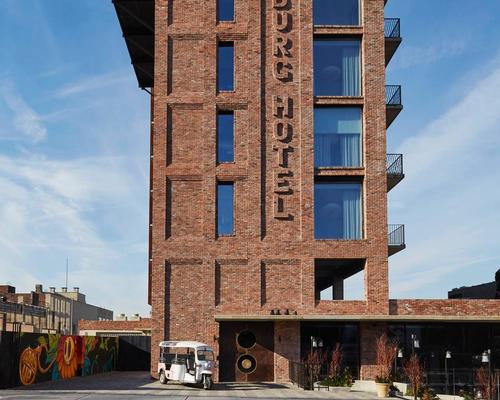 The building is designed to reflect the neighbourhood's industrial past / Annie Schlechter
