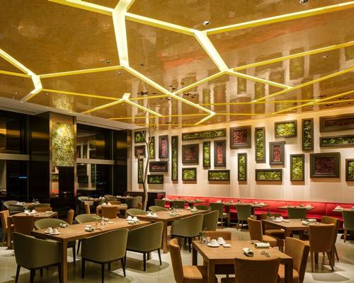 The hotel includes a verdant 'restaurant in the sky' / Ed Reeve