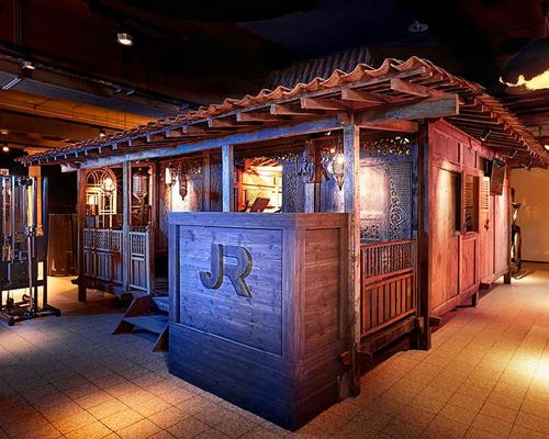An Indonesian dwelling is recreated in John Reed's Potsdam gym / John Reed
