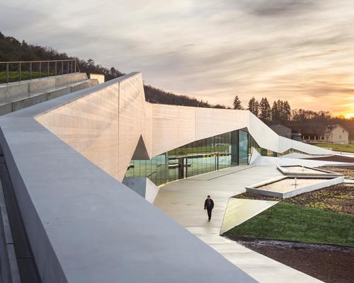 The contemporary exterior design means the visitor understands they are in the presence of a reproduction, without distracting from the power of its impact / Boegly + Grazia