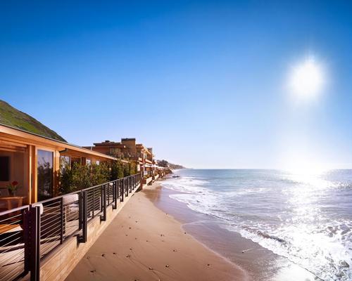 The property features 16 unique accommodations over two floors, offering panoramic views of the beach and beyond / Barbara Kent 