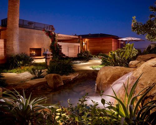 A lush garden and an open courtyard feature at the property / Barbara Kent 