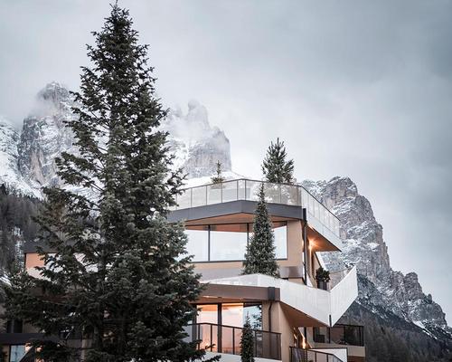 Guests can “ascend” the hotel as if it was a mountain via stairs and ramps that wind up and around the building to the summit / noa*