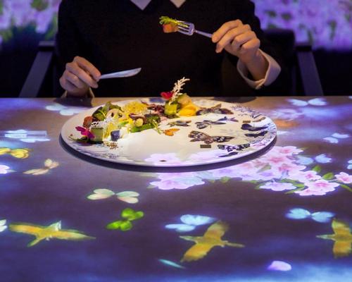 When a plate is placed on the table, the scenic world contained within the dish is unleashed in the form of an intricate light display / teamLab