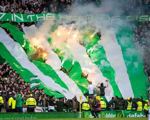 Celtic fans in the safe standing zone let of flares against Hearts in May / Craig Watson/PA Wire/PA Images
