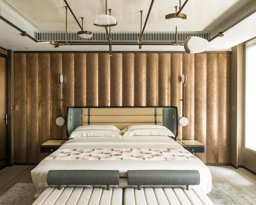Wang's custom-made furnishings appear throughout the luxurious space 