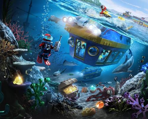Guests will make a four-minute journey through the giant aquarium, which will be populated with more than 2,000 sea creatures including sharks, stingrays and more