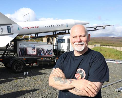 Steve Bennett of Starchaser Industries stands next to Britain's biggest reusable rocket Skybolt 2 / Owen Humphreys/PA Wire/PA Images