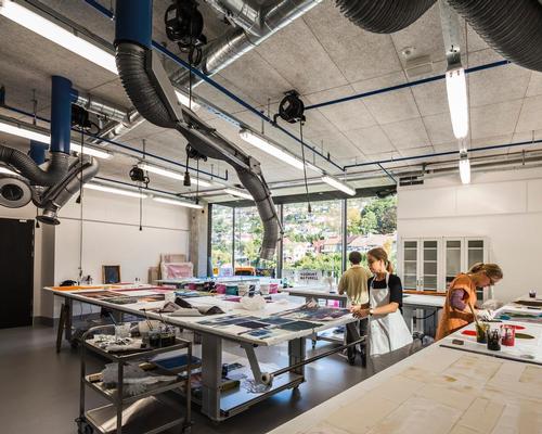 32 large workshop and display areas are equipped with heavy machinery for woodwork, ceramics, metalwork, plaster, printmaking, textiles, 3D modeling and printing, video, sound art and photography / Tomasz Majewski Photography