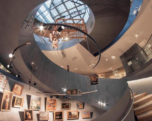 A spiral staircase provides access to the two exhibition levels and a variety of observation points / Coop Himmelb(l)au