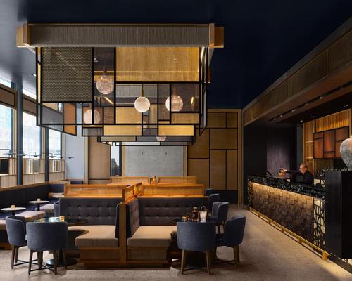The design team chose a palette of concrete, bronze, timber and glass overlaid with creative textiles and warm fabrics / Will Pryce