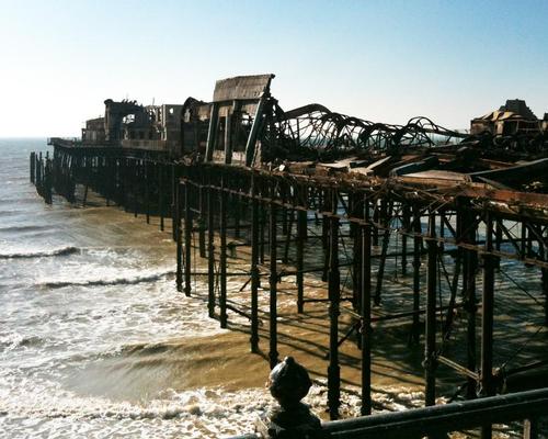 Neglected for years, the old pier closed in 2008 following storm damage, and in 2010 faced destruction when a fire ravaged the entire structure / Alex de Rijke