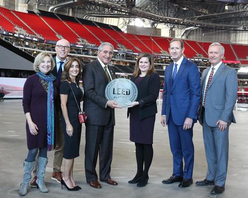 Receiving the certification (left to right): Penny McPhee, Rich McKay, Angie Blank, Arthur Blank, Shelby Buso, Paul Bowers, Scott Jenkins / HOK