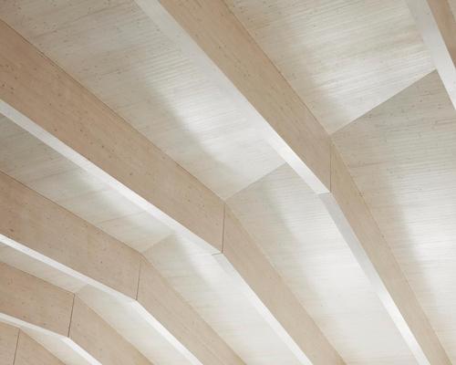 Fit out contractor Gilbert-Ash worked on the project, forming the building’s glue-laminated timber (glulam) portal frame, which is braced with cross-laminated timber (CLT) panels / Jack Hobhouse