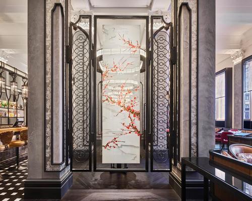 Guests are first met with a large suspended screen created by using an enamel paint technique on glass / AB Concept