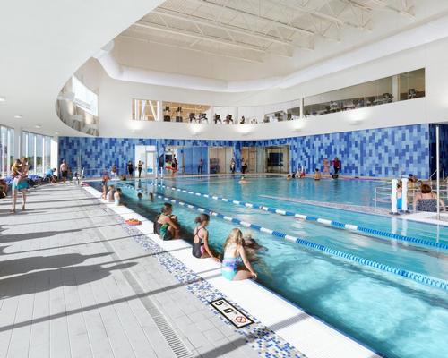 An indoor pool is prominently on display through the transparent facade in the bulbous south end of the centre
/ CannonDesign
