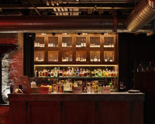 Over 60 types of gin are sold at the secret bar / Jestico + Whiles