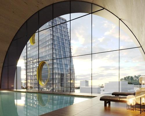 Large circular openings in the towers’ facades give a defining geometric character and will be filled with the health and social spaces / Steven Holl Architects