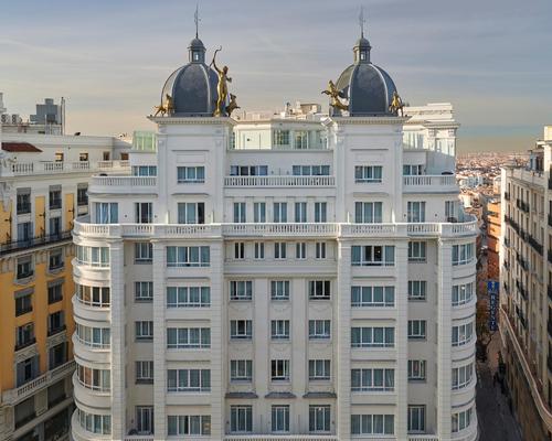 Chebaane and his studio, Blue Sky Hospitality, were tasked with converting the partially listed spaces behind the historic facade of a 1920s-era building on the upscale Gran Via shopping street / Blue Sky Hospitality