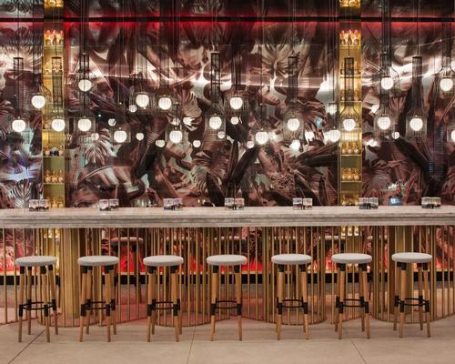 The hotel's design uses earth tones, sedimentary layers, frayed edges and raw beauty associated with the Australian Outback