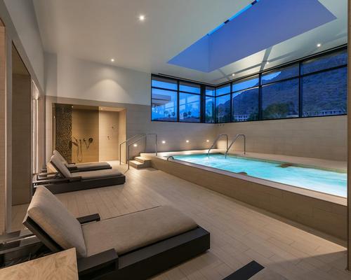 The men's hydrotherapy pool features views of the desert