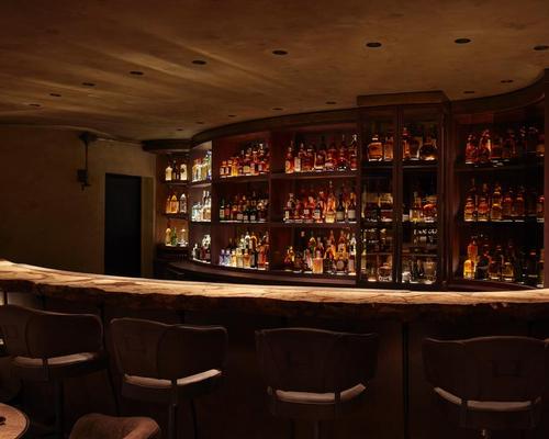 The basement bar features low light levels to nurture a sense of intimacy and emphasise the bar tops and drinks display / Joakim Blockstrom