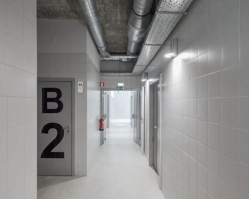 Grey is used inside and out, with interiors matching much of the facade