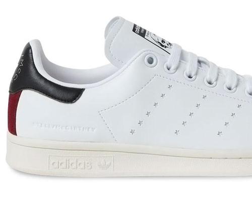 The shoe replaces Adidas’s trademark three stripe motif with a star pattern
