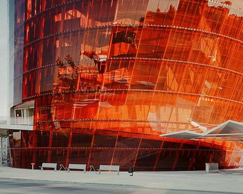 The building's amber skin gives it a vivid colour that appears to glow in the dark / Indrikis Sturmanis