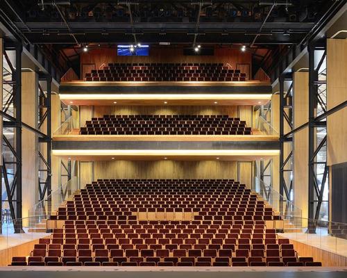 A glazed auditorium sits at the heart of the complex / Allard van der Hoek