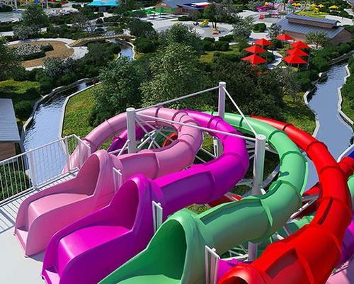 The attraction follows a Texan theme and features five slide towers with 1.3 miles of slides for visitors to make a splash / WhiteWater West