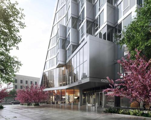 The asymmetric tetrahedron stands out from the surrounding neighbourhood buildings and appears to change in shape depending on the viewer’s vantage point / The Durst Organization/Via West 57