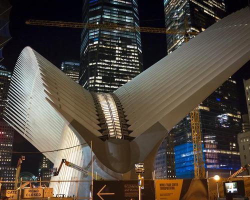 Inspired by the image of a bird released from a child's hands, Calatrava has designed the hub as a large elliptical volume of glass and steel ribs extended to create canopies over a plaza / Billie Ward