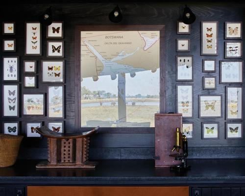 A collection of maps and insects can be found in the lodge's restaurant / Belmond Eagle Island Lodge Botswana