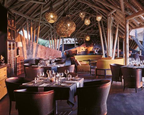 The lodge's public spaces include an arrivals boma, a bar, a restaurant, a library, an internet lounge, a camp fire area and a shop / Belmond Eagle Island Lodge Botswana