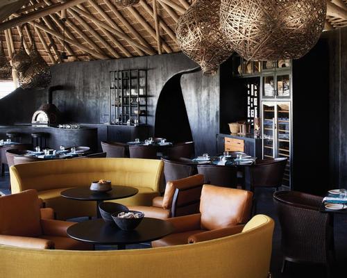 Moore's design mixes traditional art works, nature-inspired sculptures and contemporary features and matierals / Belmond Eagle Island Lodge Botswana