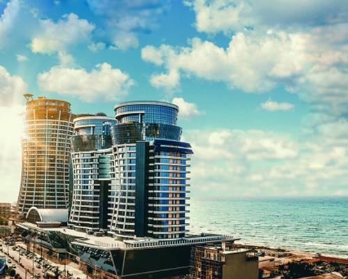The hotel will occupy a 130m (427ft) tall tower and will include 319 bedrooms, as well as seven restaurants and a spa