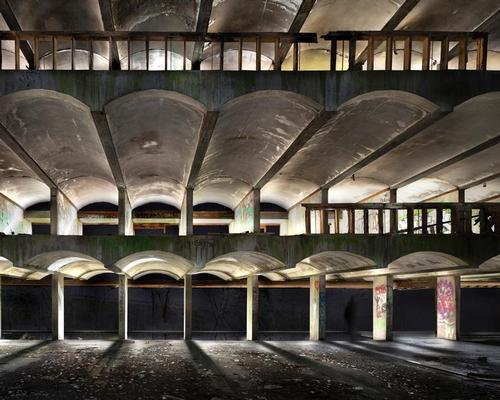 Visitors can walk through the ruined buildings of St Peter’s Seminary in Cardross while accompanied by monochromatic light installations / NVA
