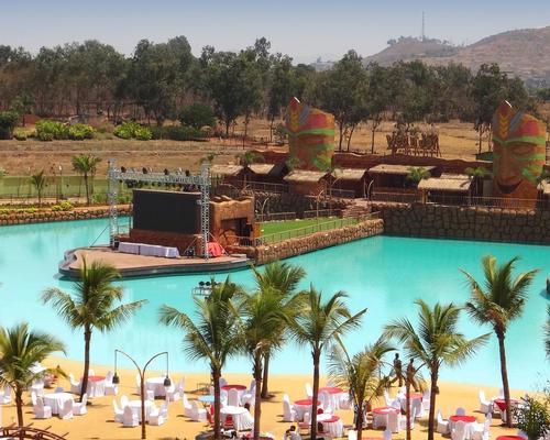 An entertainment stage is situated in the wave pool at Wet N Joy waterpark, near Pune in India