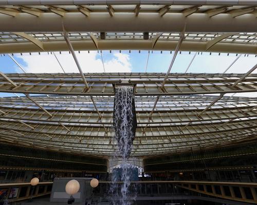 A large waterfall features as part of the design / Francois Mori/AP/Press Association Image