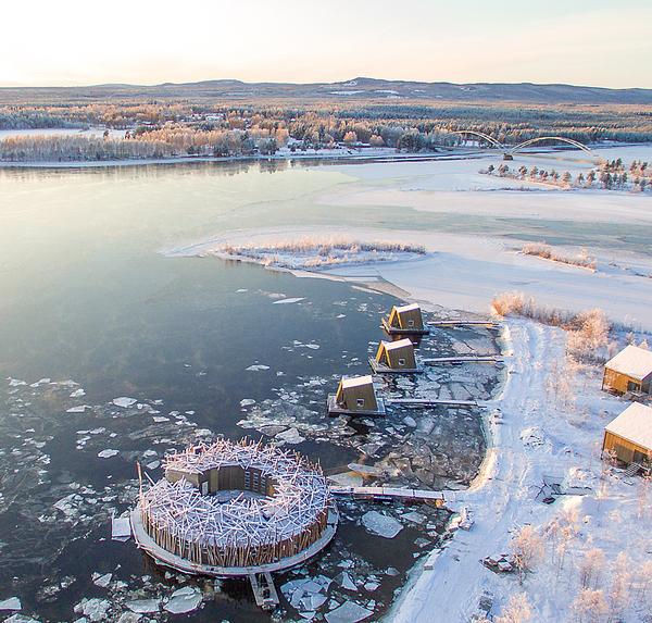 The hotel is frozen in place in the winter and will float on the Lule River in the summer