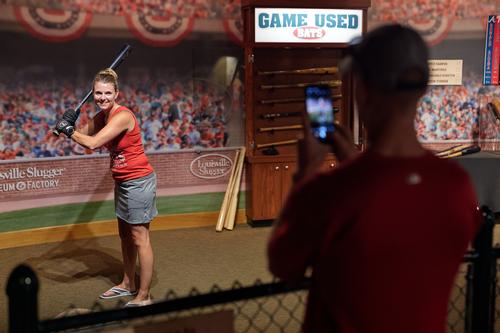Visitor can pose with game-used bats