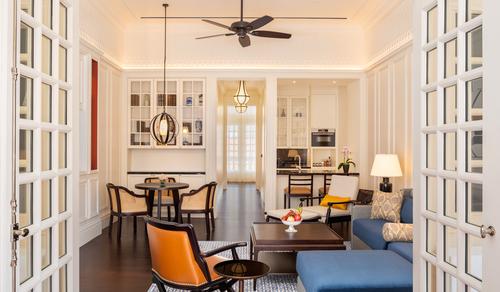 A Residence Suite living room at Raffles Singapore / Accor