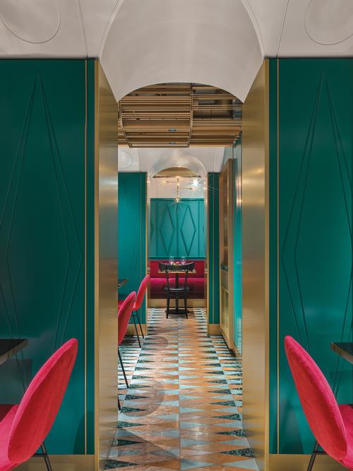 Emerald, gold and burgundy are used for different elements downstairs / Matteo Piazza