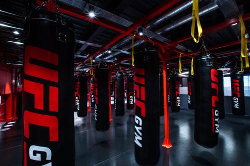 The facility features a bag area with 30 punch bags / UFC Gym