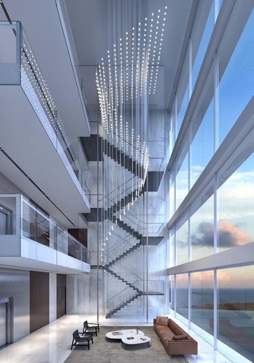 Large lobby windows will provide views out over the water / Aston Martin