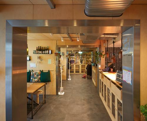A reception area and restaurant are housed on the ground floor / Edmund Sumner